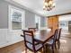 Bright dining room with hardwood floors and a barn door at 201 Ware St, Shelby, NC 28150