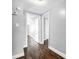 Hardwood floor hallway with access to bedrooms at 201 Ware St, Shelby, NC 28150