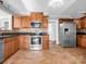 Kitchen with stainless steel appliances and wood cabinets at 201 Ware St, Shelby, NC 28150