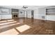 Living room with hardwood floors, fireplace and built-ins at 201 Ware St, Shelby, NC 28150