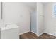 Bathroom with a modern vanity, framed mirror, and a glass-enclosed shower at 2204 Hillcrest Ave, Albemarle, NC 28001