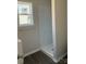 Bathroom with shower featuring floor to ceiling white marble look at 2204 Hillcrest Ave, Albemarle, NC 28001