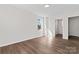 Bright bedroom with wood-look flooring, and a window offering natural light at 2204 Hillcrest Ave, Albemarle, NC 28001