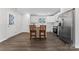 Eat-in kitchen featuring white cabinets and stainless appliances at 2204 Hillcrest Ave, Albemarle, NC 28001