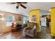 Comfortable living room with a ceiling fan and hardwood floors at 26174 Treece Rd, Albemarle, NC 28001