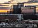 The photo shows a vibrant business district with modern buildings, storefronts and street activity at 287 Mcdonald Ave, Charlotte, NC 28203