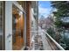 A well kept outdoor balcony area overlooking a green space at 287 Mcdonald Ave, Charlotte, NC 28203