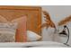Comfortable bedroom with decorative pillows, patterned headboard, and stylish bedside lamp at 287 Mcdonald Ave, Charlotte, NC 28203