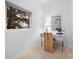 Bright room featuring a desk, neutral decor, and a view of the outdoors from a large window at 287 Mcdonald Ave, Charlotte, NC 28203