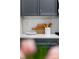 Kitchen countertop features white backsplash, wooden cutting board, and utensil holder at 287 Mcdonald Ave, Charlotte, NC 28203