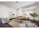 Bright living room featuring modern furnishings, hardwood floors, and neutral color palette at 287 Mcdonald Ave, Charlotte, NC 28203