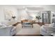 Bright living room featuring modern furnishings, hardwood floors, and neutral color palette at 287 Mcdonald Ave, Charlotte, NC 28203