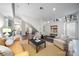 Bright living room with hardwood floors, modern furniture, and a comfortable seating area at 287 Mcdonald Ave, Charlotte, NC 28203