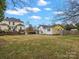 Large backyard featuring a detached garage and privacy fence at 331 E White St, Rock Hill, SC 29730