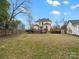 Spacious backyard with a deck, a hot tub, and privacy fence at 331 E White St, Rock Hill, SC 29730