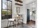 Cozy kitchen nook featuring a round table with seating and a view of the backyard at 331 E White St, Rock Hill, SC 29730