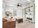 Bright living room with hardwood floors, white ceiling beams, and comfortable furniture at 331 E White St, Rock Hill, SC 29730
