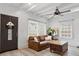 Cozy living room featuring exposed beam ceilings, neutral walls, and bright natural light at 331 E White St, Rock Hill, SC 29730
