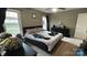 Cozy bedroom featuring natural light from two windows, a ceiling fan, and carpet flooring at 3331 Tamworth Ln, Gastonia, NC 28052