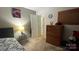 A cozy bedroom with comfortable carpet, natural light, and a classic wooden dresser with a charming design at 3331 Tamworth Ln, Gastonia, NC 28052
