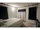 Comfortable bedroom with a neutral color scheme, perfect for relaxation and personalization at 3331 Tamworth Ln, Gastonia, NC 28052
