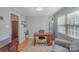 Home office features hardwood floors and ample sunlight; an ideal workspace for productivity at 4001 Glenfall Ave, Charlotte, NC 28210