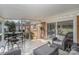 Inviting screened-in porch with comfortable seating and access to the backyard at 4001 Glenfall Ave, Charlotte, NC 28210