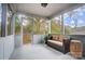 Relaxing screened porch with wicker furniture at 403 Little St, Lincolnton, NC 28092