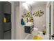 Modern bathroom with floating vanity and yellow accents at 4129 Carnoustie Ln, Charlotte, NC 28210