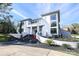 Modern home showcasing a stylish facade and manicured landscaping at 4129 Carnoustie Ln, Charlotte, NC 28210
