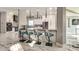 Modern kitchen with island and breakfast bar seating at 4129 Carnoustie Ln, Charlotte, NC 28210