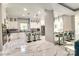Modern kitchen with double island and breakfast bar seating at 4129 Carnoustie Ln, Charlotte, NC 28210