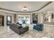 Living room with access to pool and patio, featuring a modern fireplace at 4129 Carnoustie Ln, Charlotte, NC 28210