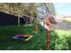 Large backyard playground with various play structures at 4129 Carnoustie Ln, Charlotte, NC 28210