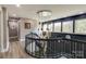Modern curved staircase with a sleek metal railing, offering a stylish design element at 4129 Carnoustie Ln, Charlotte, NC 28210