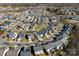 Aerial view of a residential neighborhood with well-maintained homes, landscaped yards, and tree-lined streets at 4866 Breden St, Kannapolis, NC 28081