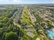 A picturesque aerial view of a Primary-planned community featuring tree-lined streets and manicured lawns at 4866 Breden St, Kannapolis, NC 28081