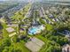 Overhead shot of a neighborhood with a pool, tennis court, sand volleyball, and basketball court at 4866 Breden St, Kannapolis, NC 28081