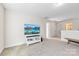 Light-filled bonus room with neutral carpet, TV, and ample space for relaxation and entertainment at 4866 Breden St, Kannapolis, NC 28081