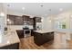 Well-appointed kitchen with a center island, granite countertops, and stainless steel appliances at 4866 Breden St, Kannapolis, NC 28081