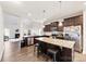 Open kitchen with granite countertops, stainless steel appliances, and a spacious island at 4866 Breden St, Kannapolis, NC 28081