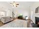 Bright and airy living room with hardwood floors, a fireplace, and soaring ceilings at 4866 Breden St, Kannapolis, NC 28081