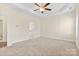 Spacious carpeted main bedroom with ensuite bathroom access at 4866 Breden St, Kannapolis, NC 28081