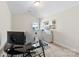 Functional room setup, ideal for use as a home office, featuring a spacious desk and ample lighting at 4866 Breden St, Kannapolis, NC 28081
