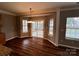 Bright breakfast nook with slider doors and light fixture at 5934 Hickory Hollow Ct, Harrisburg, NC 28075