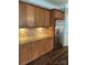 Kitchen with granite countertops and stainless steel refrigerator at 5934 Hickory Hollow Ct, Harrisburg, NC 28075