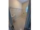 Functional laundry room with a utility sink, shelving, and a window for natural light at 5934 Hickory Hollow Ct, Harrisburg, NC 28075