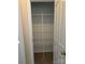Walk-in pantry with white wire shelving and neutral carpet at 5934 Hickory Hollow Ct, Harrisburg, NC 28075