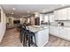 Open floorplan with a kitchen island, stainless steel appliances, and modern finishes at 7514 Highway 205 Hwy, Marshville, NC 28103