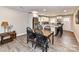Open floorplan featuring kitchen, dining and living areas, stainless steel, white cabinets, granite counters at 7514 Highway 205 Hwy, Marshville, NC 28103
